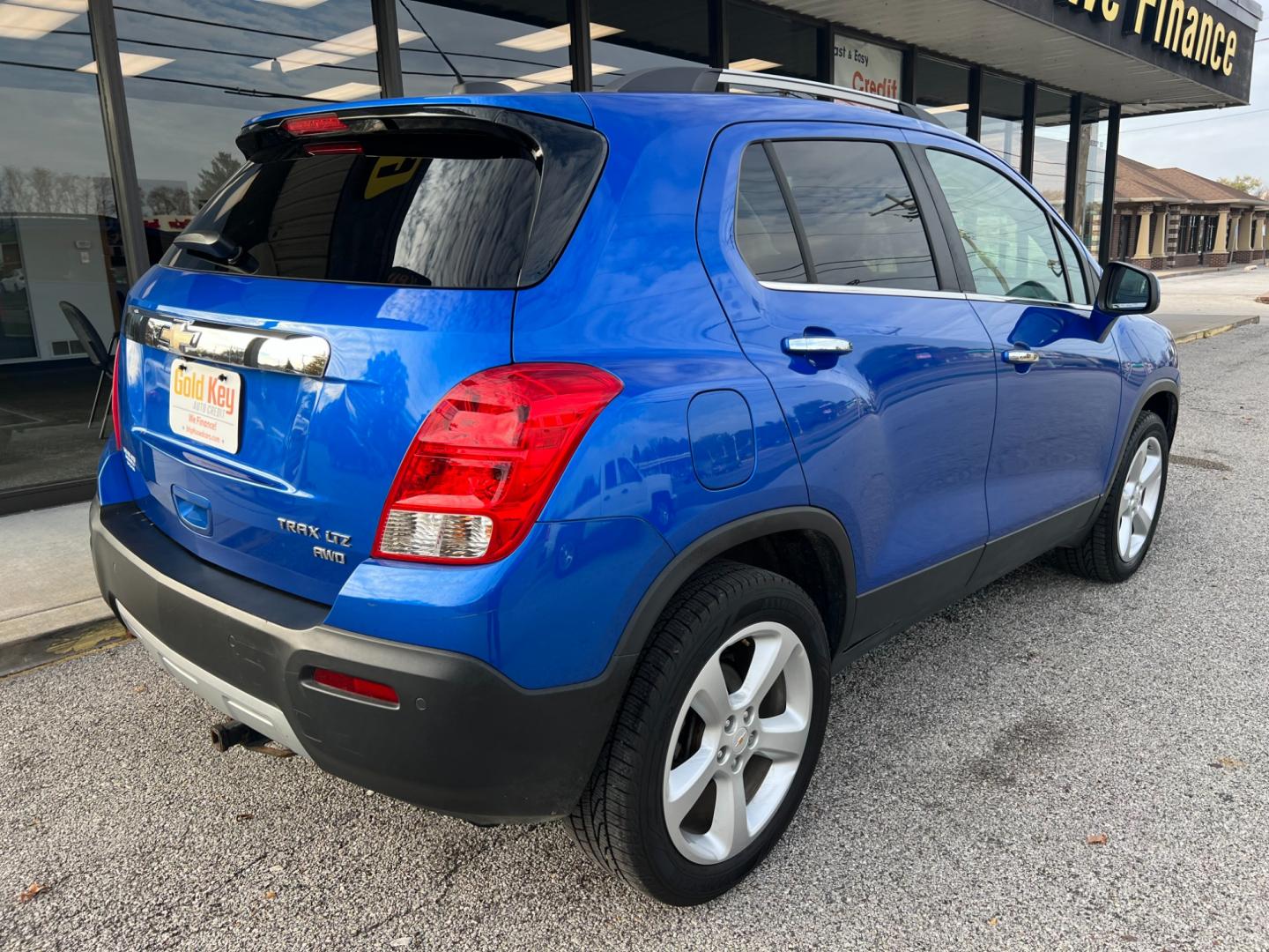 2015 Brilliant Blue Metal Chevrolet Trax LT AWD (KL7CJTSB3FB) with an 1.4L L4 DOHC 16V engine, 6-Speed Automatic transmission, located at 1633 W Kimberly, Davenport, IA, 52806, (563) 323-5341, 41.559456, -90.598732 - Photo#3